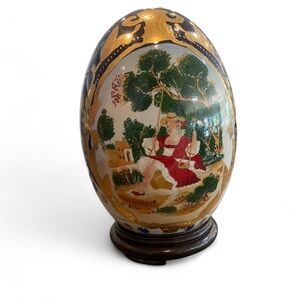 Unique Vintage Ceramic Egg with Gold and Red Design